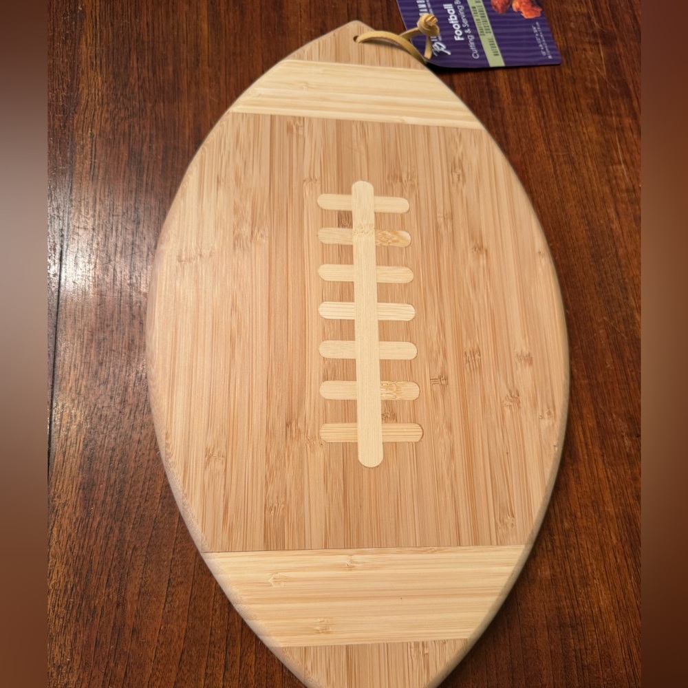 NWT football shaped bamboo cutting & serving board